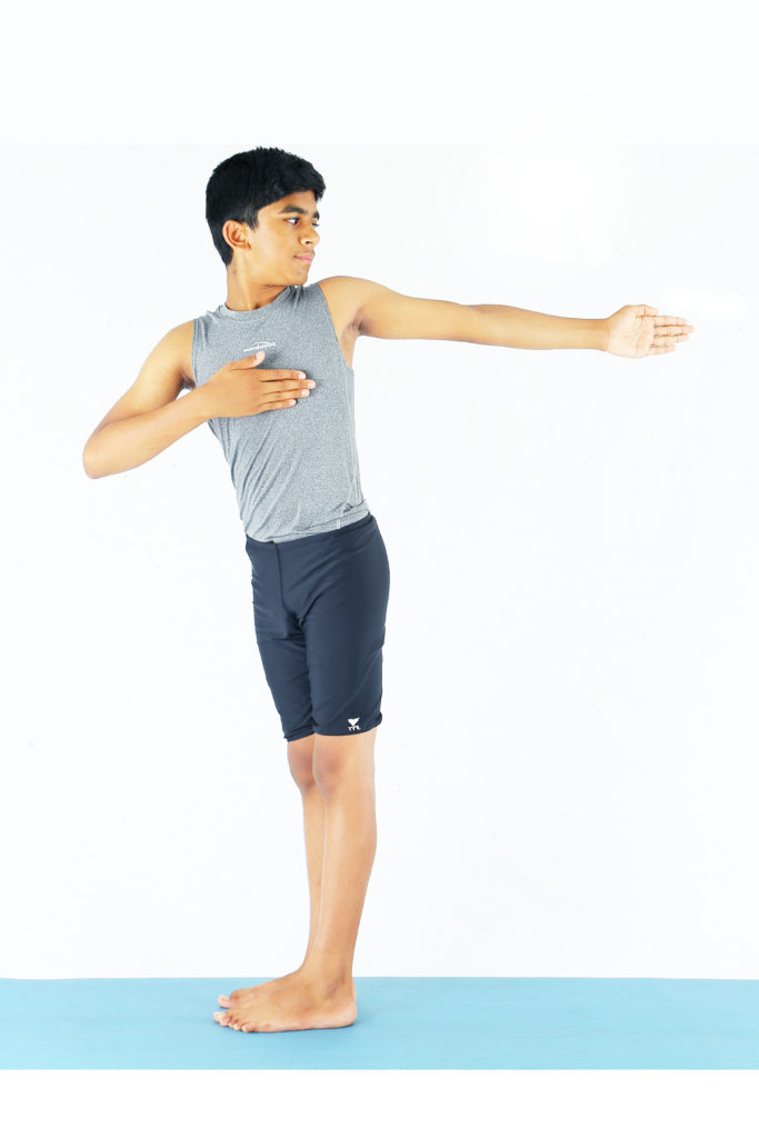 Kati Chakrasana {Standing Spinal Twist Pose}-Steps And Benefits - Sarvyoga  | Yoga